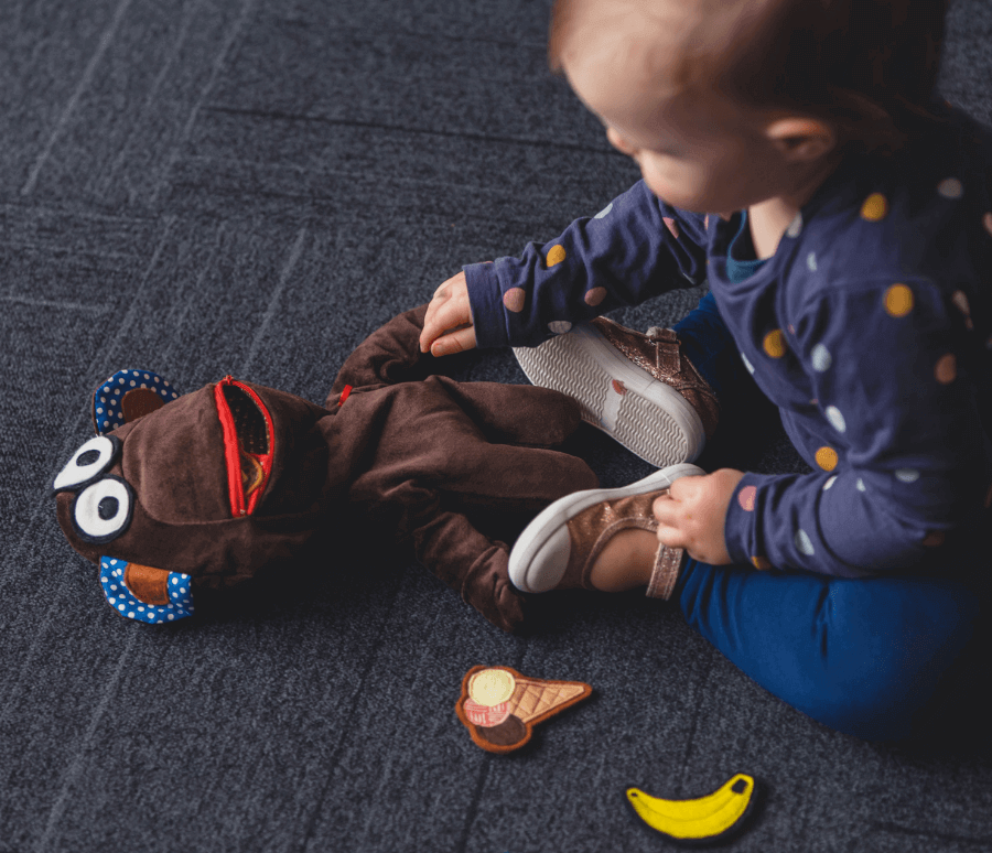 child with therapy doll